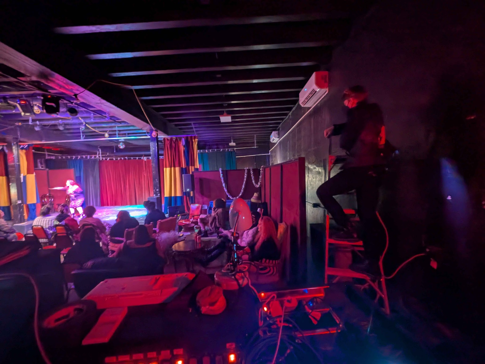 Me as an impromptu spotlight operator for Anti-Valentine's Punk Drag.